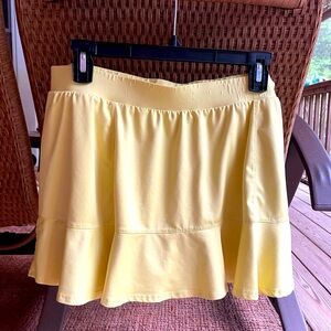 Tail Butter Yellow Tennis skirt with flared hem. Sz. XL